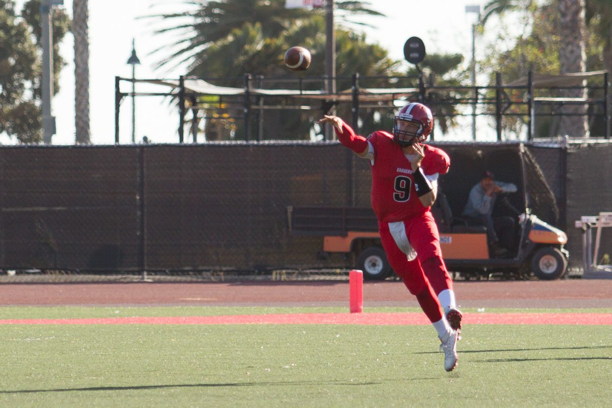 Freshman quarterback Gerald Hickson (No. 9) launches a pass to sophomore wide receiver Donald Lambert (No. 7) during second quarter against Compton College Saturday, Sept. 23 at La Playa Stadium in City College. The Vaqueros passed for 247 yards and two touchdowns outperforming Compton 48-16.