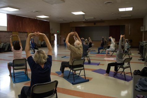 All ages and stages yoga class working on arm flexibility by copying teacher Fredda Spirka Tuesday, Sept. 12, in Wake Campus Room 33 in Santa Barbara. Spirka’s class meets every Tuesday from 9:30 to 10:30 a.m.