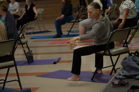 All ages and stages gentle yoga student Sharan Crandall, 77, imitating her instructors arm movements Tuesday, Sept. 12, in Wake Campus Room 33 in Santa Barbara.“It’s helped me definitely in my general fitness,” Crandall said. “I’m quite old and it’s kept me young.”