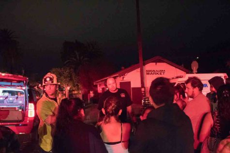 Fire Department Battalion Chief Jim McCoy, center, telling all the displaced families they will need to find a place to stay for the night early Tuesday morning, Sept. 5, 2017, in Santa Barbara, Calif. McCoy informed them that if they had nowhere to stay they would call Red Cross and find a place for them.