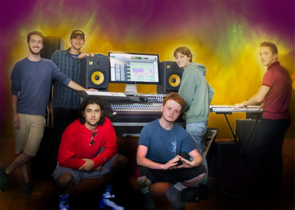 Students pose with music equipment Wednesday Sept. 20, which they learn to use in James Watson’s electronic music recording class at City College. The goal of this class is to get students comfortable with the equipment and prepare them to get a job in the music industry.