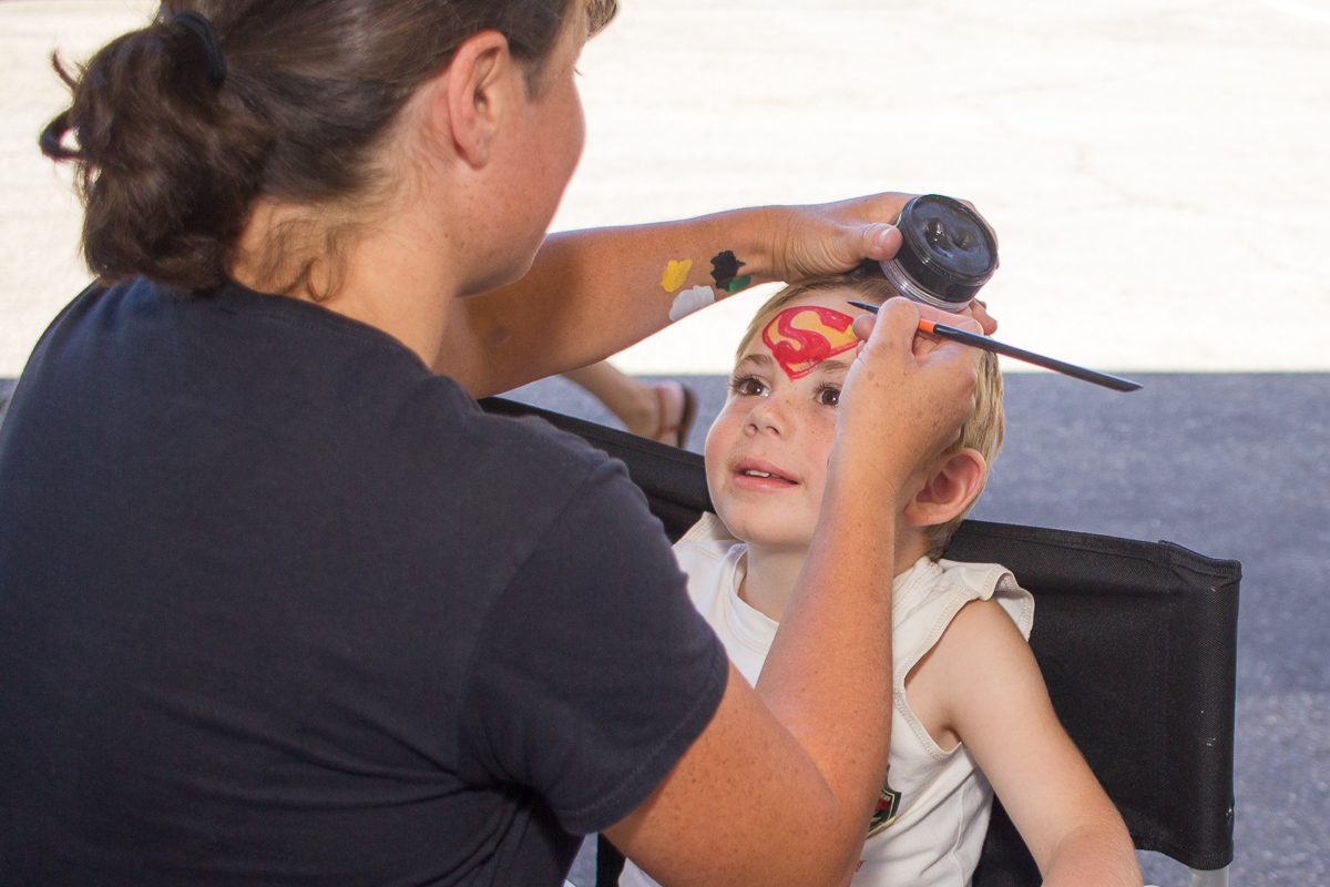 Five-year-old Evan Augustus gets his face painted by Maria Perez during the annual Touch-A-Truck event Sunday, Sept. 24, 2017, at City College in Santa Barbara, Calif. The events largest donation came from the Crane Country Day School, which donated over $2,500.