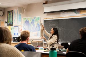 Stephanie Mendes, the new full-time earth and planetary sciences instructor, explains longshore drift to her oceanography class Tuesday, Sept. 19 in Earth and Biological Sciences Building Room 115 in City College. 