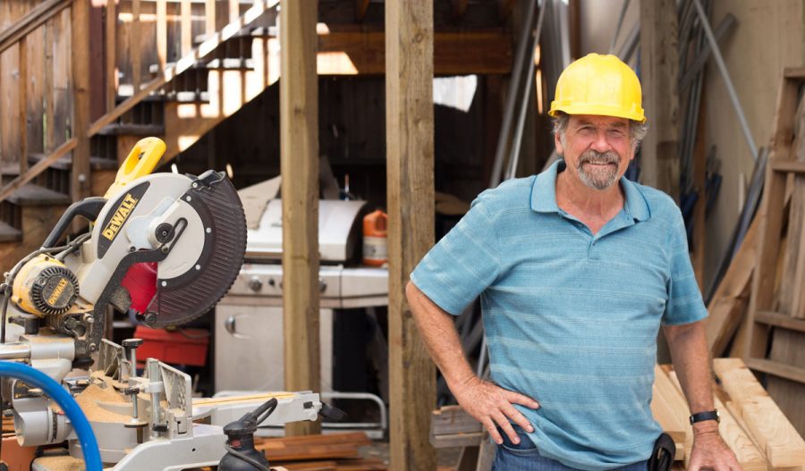 Patrick Foster, Head of the construction company, hangs out in his lumber room Thursday, Oct. 5 at the City College Wake Center. Foster is retiring from the program this semester.