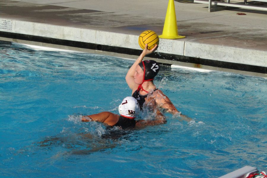 Courtesy art from David Loveton of Sarah Parson looking to pass to a teammate during a match against Golden West from.