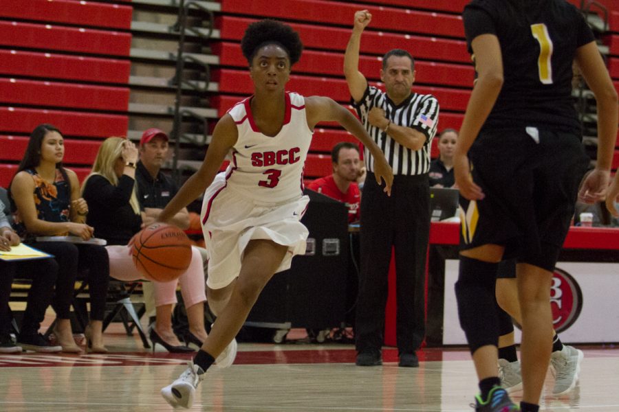 Meagan Moore (No. 3), shooting guard for City College, drives towards the basket against Taft College Friday, Nov. 10, at the Sports Pavilion gym. The Vaqueros defeated the Cougars 98-73.