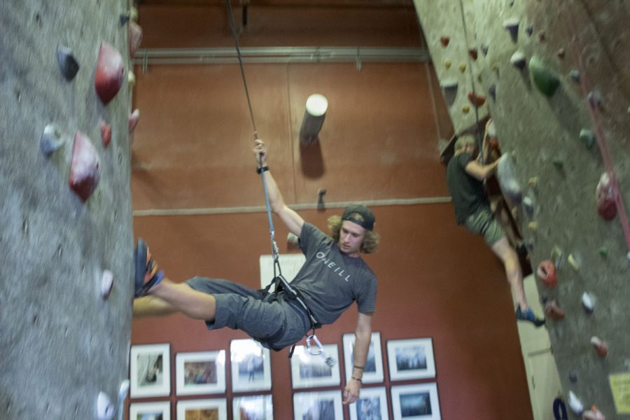 Channels reporter Aidan Anderson repelling down a rock wall Thursday, Nov. 9, at the Santa Barbara Rock Gym located on 322 State Street downtown.