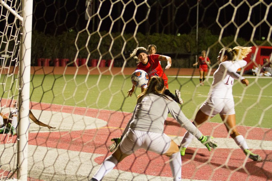 City College forward Lourdes Gilbert (No. 14) scores the first goal against the Antelope Valley College Marauders Saturday night, Nov. 18, at La Playa Stadium. Gilbert scored two of the four goals during the women’s soccer teams first round playoff game.