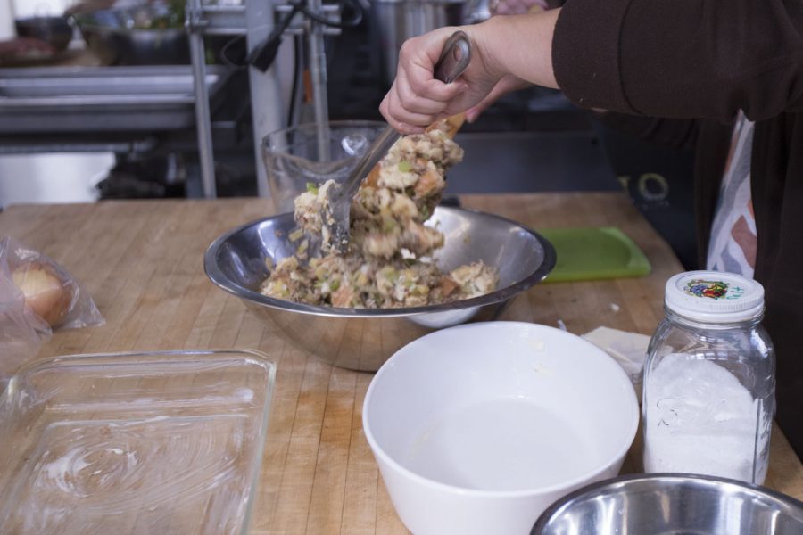 Yolanda Figueroa mixes the stuffing Wednesday, Nov. 15, at the Culinary Lab in Schott Campus.
