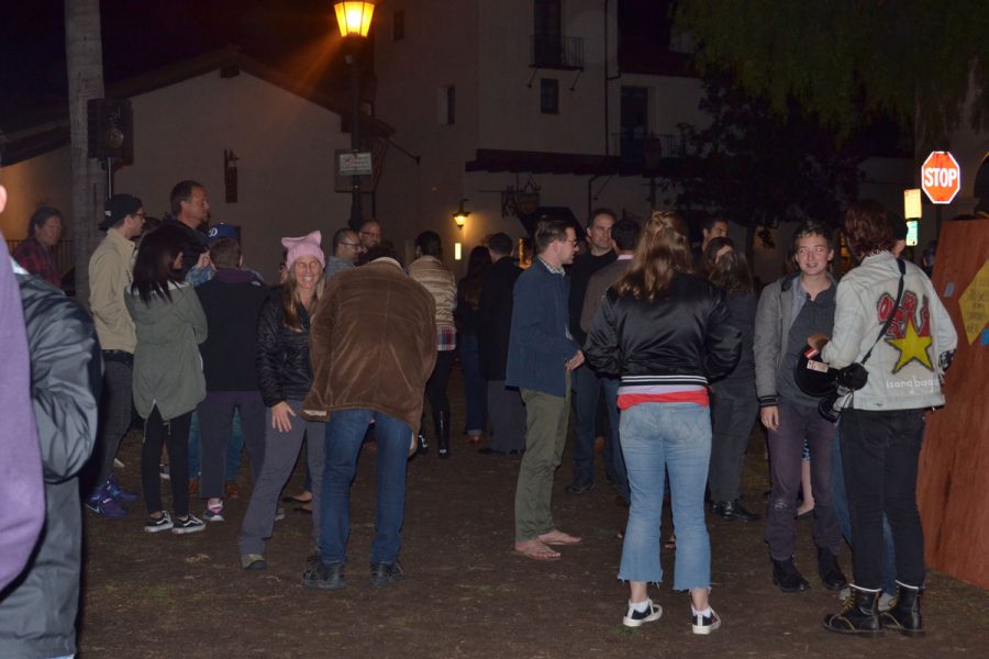 People gather to support “A Community Response Against Hate Rally” Thursday night, Nov. 16, downtown at De La Guerra Plaza. The rally was set up by the Pacific Pride Foundation after Ethan Bertrand, the board president of the Isla Vista Community Service District, was verbally assaulted by James Gelb, a local property owner.