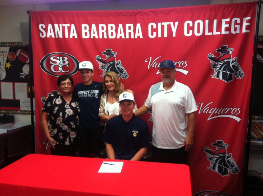 Courtesy art from Dave Loveton of John Jensen with his family during National Signing Day on Wednesday, Nov. 8, in the Sports Pavilion. Jensen signed a Letter-of-Intent to continue his baseball career at University of California Irvine.