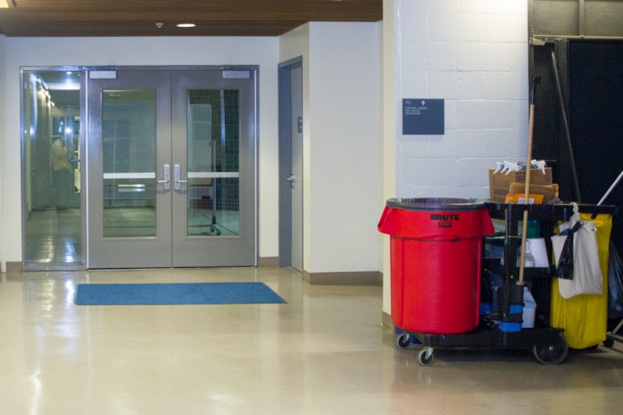 A janitorial cart rests after the Drama and Music Building Thursday night, Nov. 16, at City College. The janitorial staff attempts to keep the City College campus clean even with recent budget cuts and staffing shortages.