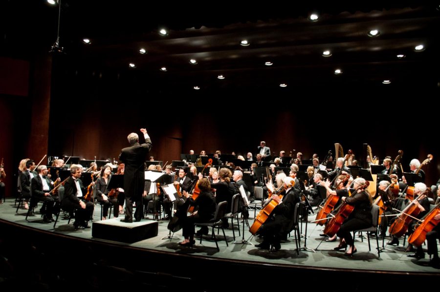 Professor James Mooy’s conducts the City College symphony during their live performance at the Garvin Theatre Sunday, Nov. 19.