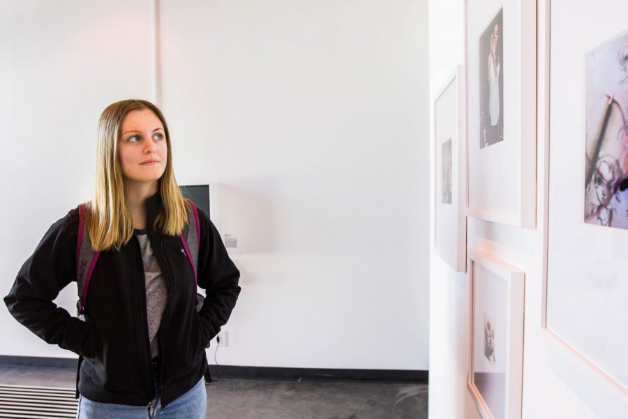 Hayze Law, student at Santa Barbara City College looks at art by Rita Basulto called ‘Making of Lluvia en los ojos photographs’ on Thursday, Feb. 15. The art is exhibited at the Atkinson Gallery at Santa Barbara City College.