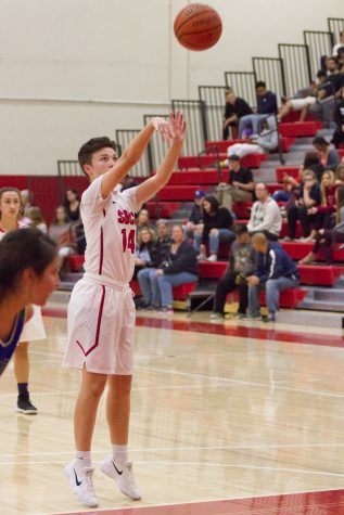 Holly Barrera (no. 14) makes a free throw for the Vaqueros during a game on Wednesday, Feb. 7. 