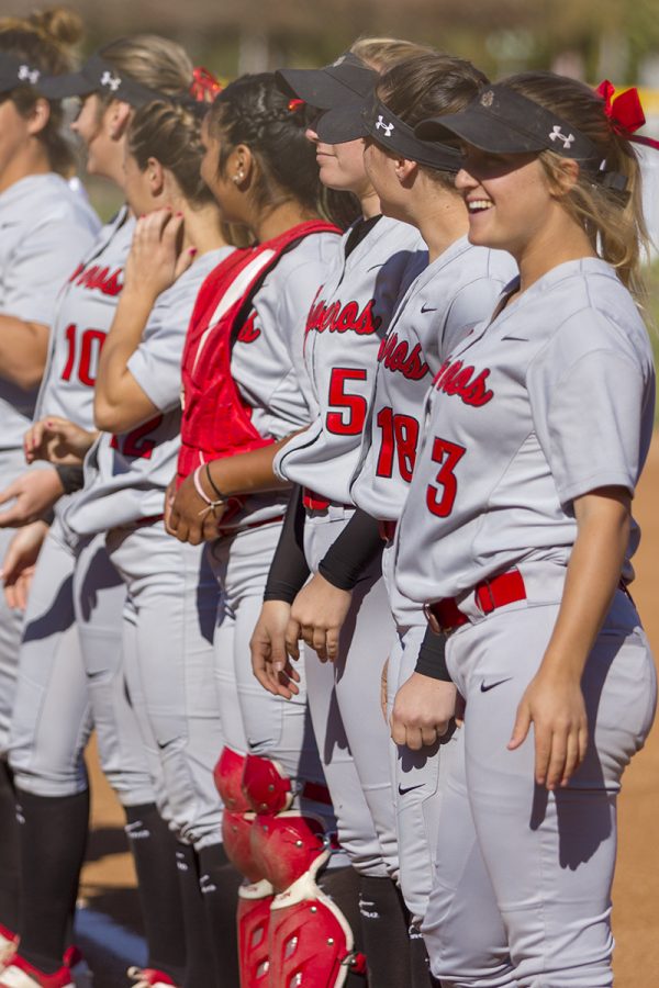 The Santa Barbara City College Vaqueros softball team lines up for introductions before their game at Pershing Park in Santa Barbara on Tuesday, Feb. 20 against the Los Angeles Pierce College Eagles. The Vaqueros played a strong game and came back from a low scoring first half to win 8-6 against the Eagles.
