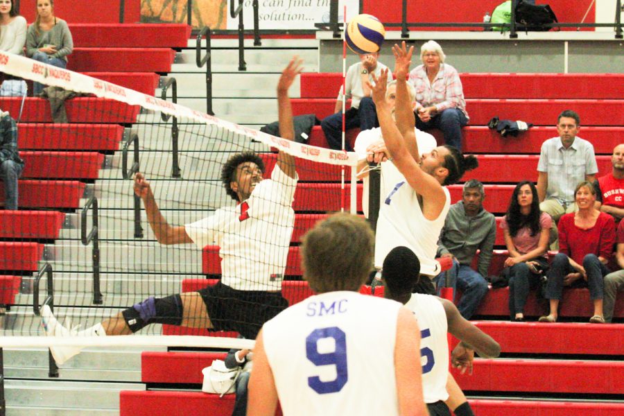 Outside hitter Haward Gomes (No. 4) hits a point for the Vaqueros on Wednesday, Feb. 28, in the Sports Pavilion at Santa Barbara City College. The Santa Barbara City College mens volleyball team played the Santa Monica College Corsairs.