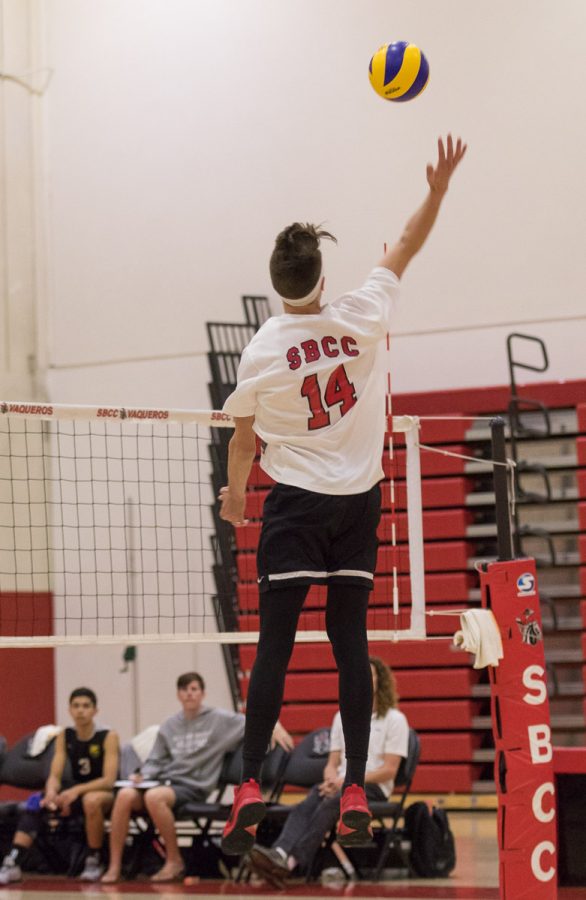 Kyle Skinner, attacker for the Vaqueros, spikes the ball against Grossmont College, on March 10, at the Sports Pavilion. The Vaqueros won the set 25-23.