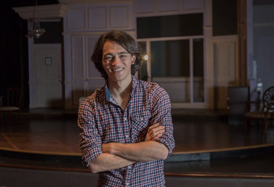 City College student Patrick Lownes-Santos on Monday, March 13, in the Garvin Theatre. He is currently the stage manager for the play Communicating Doors.