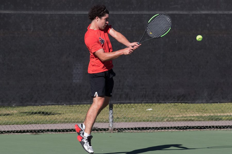 Arthur Scharff, Santa Barbara City College Vaquero, hits the ball back to Augustin Lestelle, Ventura College Pirate, during their single match on Thursday, March 8.