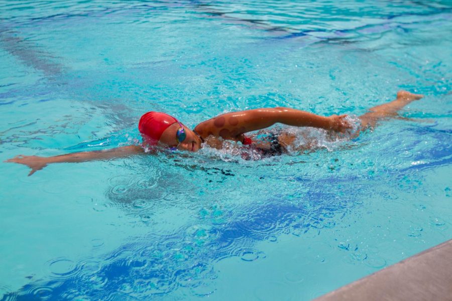 Kelee Shimizu, swimming at San Marcos High School. Shimizu, a freshman swimmer competes in distance freestyle for the Vaqueros.