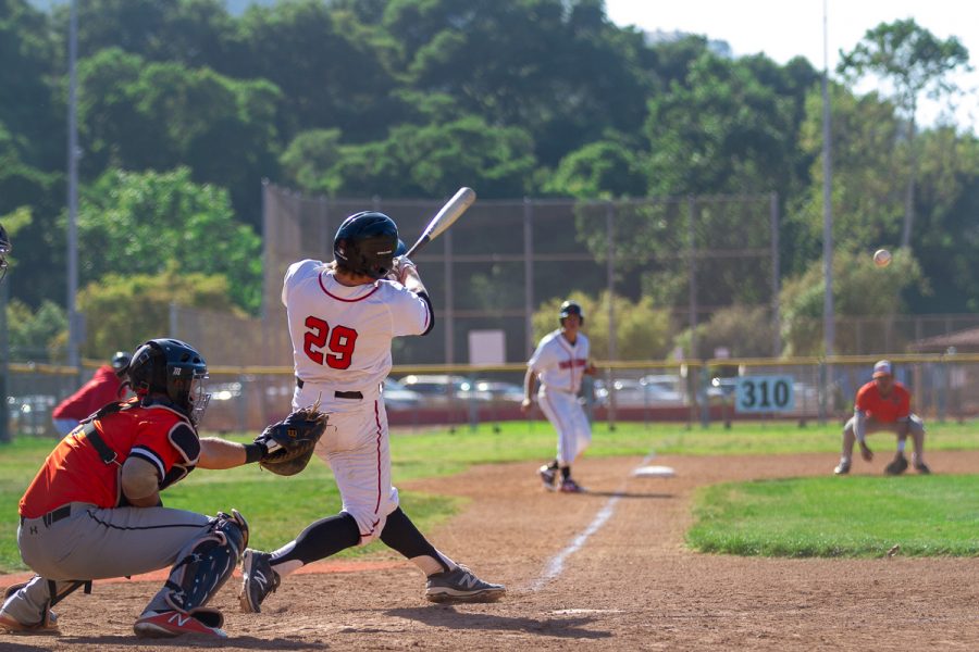 Jake Holton, Santa Barbara City College Vaquero, hits the game winning ball, as John Jenson waits to run from third base to home plate, and score run number 7. On Thursday, April 26, the Vaqueros played their last game of the season to qualify for the semi-finals, beating out the Ventura College Pirates, 7-5, at Pershing Park, in Santa Barbara.