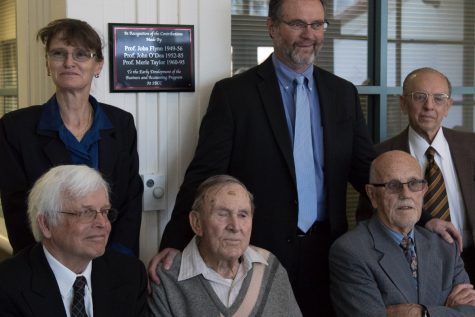 Accounting department co-chairs Cornelia Alsheimer-Barthel and Alfonso Vera-Graziano (top right), and Superintendent-President Anthony Beebe honor John Flynn, John O’Dea and Merle Taylor with a plaque on Monday in the Business-Communication Center. Flynn's son (bottom left) came to the event on his father's behalf and celebrated with O'Dea (seated in the middle) and Taylor.