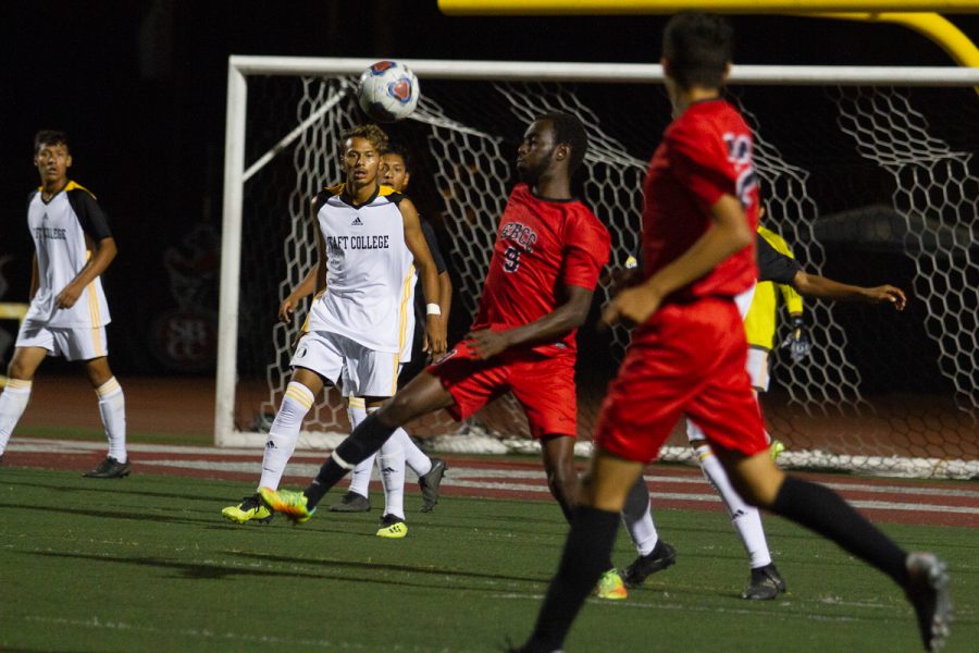 City College forward Kevin Kwizera (No. 9) intercepts a pass at La Playa Stadium at Santa Barbara City College on Friday, Sept. 21.