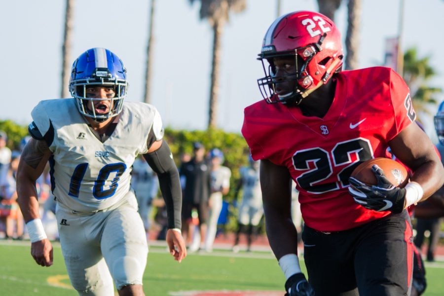 Will Bayonne, running back, attempts a second down run at La Playa Stadium at City College in Santa Barbara, Calif., on Saturday, Sept. 8, 2018. Bayonne picked up eleven yards, giving the Vaqueros a first down, putting them in the red zone (inside the twenty yard line).