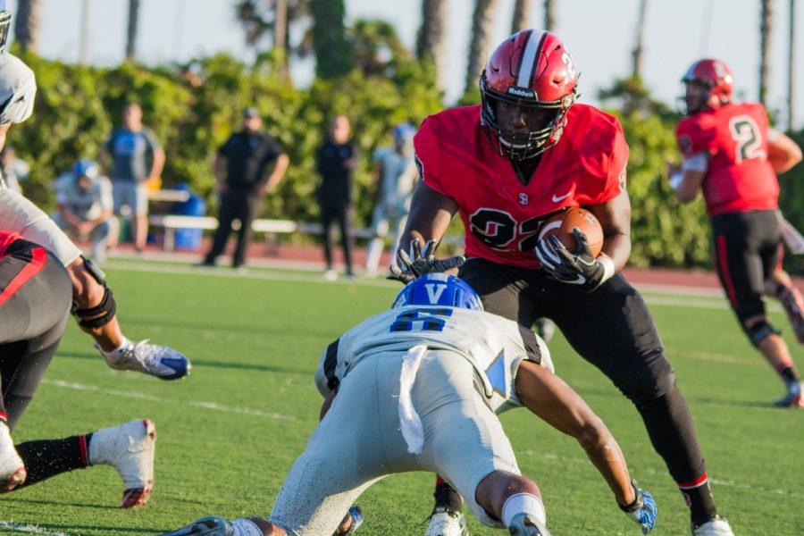 Will Bayonne, running back, avoids a near stop by San Bernardinos defense at La Playa Stadium at City College in Santa Barbara, Calif., on Saturday, Sept. 8, 2018. Bayonne jumped over the defender picking up a few yards.