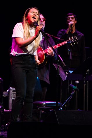 Tess Erskine sings alongside John Clark, City College’s music department Chairman, at the Lobero Theatre in Santa Barbara, Calif., on Wednesday, Oct. 10, 2018. Erskine grew up in a musical household and has been singing and creating music from an early age.