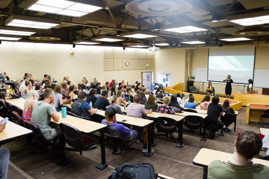 Artist Alison O'Daniel, towards the right in the orange and yellow shirt, participates in a discussion called “The Politics of Access and Visual Sound” at the Administration Building at City College on Friday, Nov. 2, in Santa Barbara, Calif. O'Daniel is also hard of hearing and one of the reasons she creates her work is so she can help others understand the spectrum of sound that one can experience.