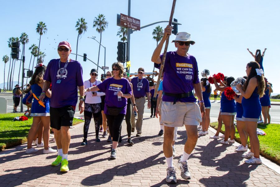 San Marcos High cheers on the participants as they make their way back to the Hilton during the annual Walk to end Alzheimer’s on Saturday, Nov. 3, in Santa Barbara, Calif.