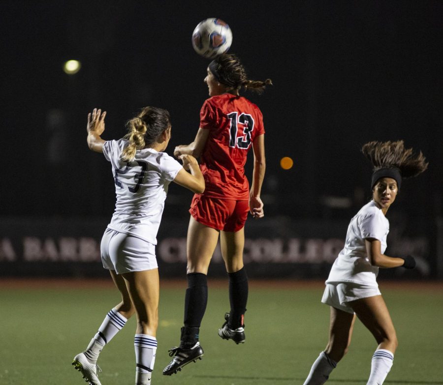 Mila Ladek (No. 13) heads the ball to a Lady Vaquero teammate during game one of the playoffs on Saturday, Nov. 17, 2018, at La Playa Stadium at Santa Barbara City College, Santa Barbara, Calif.