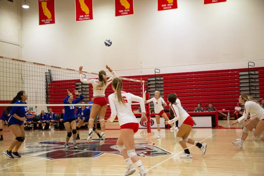 Lady Vaqueros Kate Richardson (No. 12) hits the ball during a match against Allan Hancock College on Wednesday, Oct. 31, 2018, at City College, in Santa Barbara, Calif. Richardson finished the game with eight kills and two blocks against the Bulldogs.