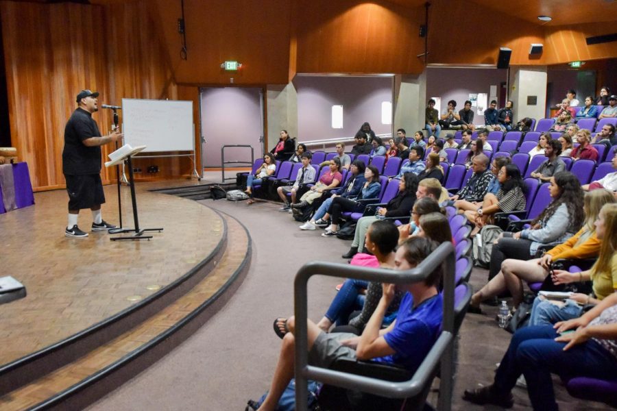 Miguel Cruz shares his poetry during the “Putting Inequity to Rest” poetry slam on Thursday, Nov. 1, 2018, at City College in Santa Barbara Calif. Cruz organized the event in honor of Dia De Los Muertos and to give students a platform to have their voices heard.