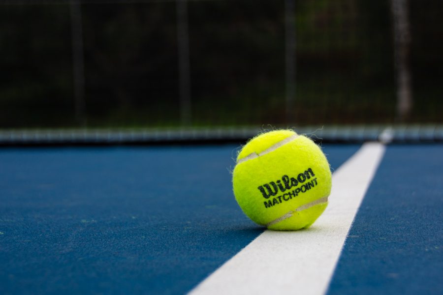 A Wilson ball lies at the sideline of a tennis court on Tuesday, Dec. 4, at Pershing Park in Santa Barbara, Calif. The Vaqueros welcome back coach Kelly Klein as she enters her second year as head coach for the Lady Vaqueros.