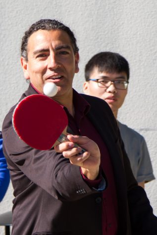 Arturo Rodriguez, dean of student affairs at City College, hits the ball during a game of table tennis the Ping Pong Club hosted outside the main campus cafeteria on Thursday, Feb. 7, 2019, at City College in Santa Barbara, Calif. Rodriguez will be donating a ping pong table to the club.