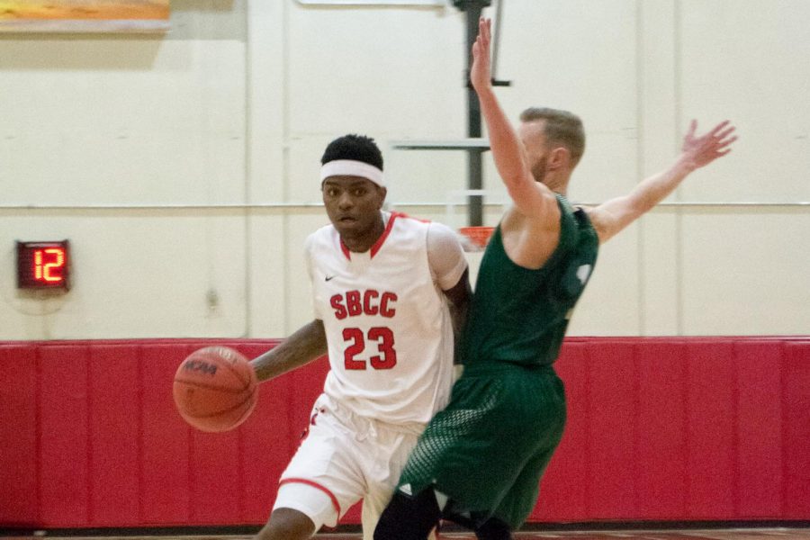 Zeke McMurtry (No. 23) charges past a Cuesta defender, Joshua Wilson-Murry late in the second half of the game on Feb. 16, 2019, at City College in Santa Barbara, Calif. The Vaqueros lost the game 76-57.