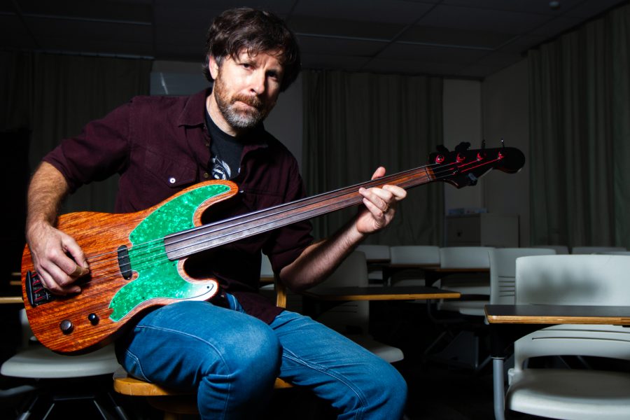 Philosophy Professor Marc Bobro plays his custom bass in the Interdisciplinary Center Building on Friday, March 8, 2019, at City College in Santa Barbara, Calif. Bobro is the bassist in the band Crying 4 Kafka and has been playing bass for about 40 years.