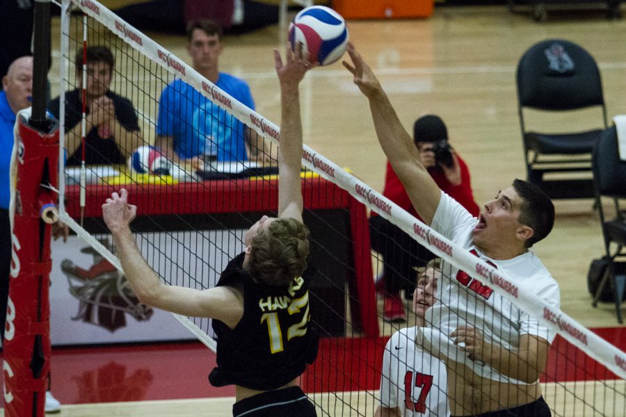 Vaquero middle blocker Cameron Clouse (No. 12) spikes the ball against Santiago Canyon on Friday, March 15, 2019, inside the Sports Pavilion at City College in Santa Barbara, Calif.