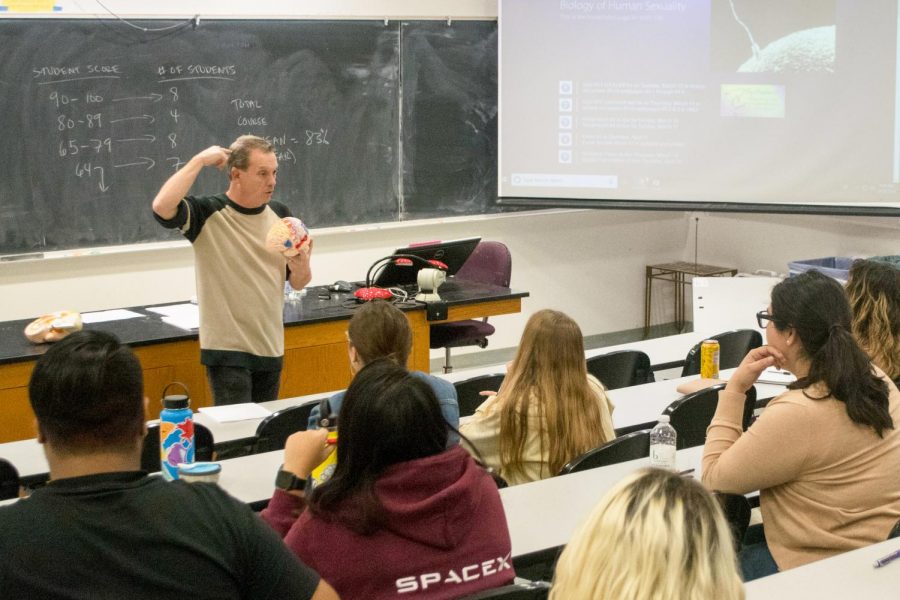 Blake Barron describes teaches students about the brain in his Biology of Human Sexuality class in the Earth and Biological Sciences Building Room 301 on Thursday, March 14, 2019 at City College in Santa Barbara, Calif.