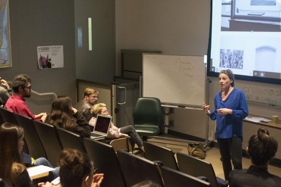 Mirjam Wendt explains to the audience her job as an art curator in museums and exhibits in the Humanities Building Room 111 on Thursday, March 7, 2019 at City College in Santa Barbara, Calif.