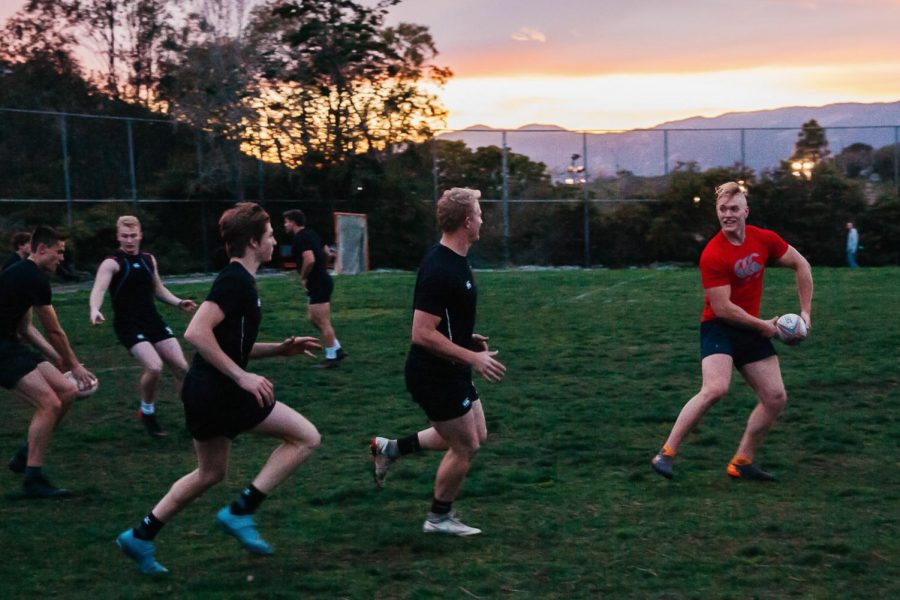 Sebastian Thogersen prepares to pass the ball to teammates during the SBCC men’s rugby practice on Monday, March 11, 2019, at Elings Park in Santa Barbara, Calif. The team worked on spacing, passing and communication durning the practice.