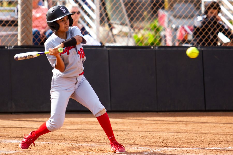 City College outfielder Kayana Diaz (No. 10) hits the ball against Moorpark College on Thursday, April 11, 2019, at Pershing Park in Santa Barbara, Calif. The Vaqueros won the match against the Raiders 11-7.