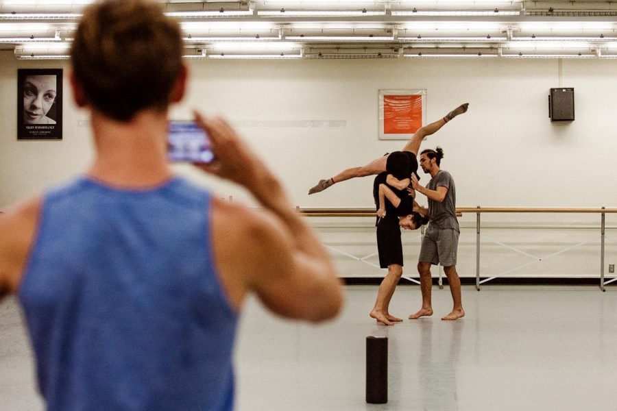 Dance Collective Director Tracy Kofford video records dance practice during rehearsal on Tuesday, April 2, 2019, in the Sports Pavilion at City College in Santa Barbara Calif. Normally, classes are held in-person on campus, however COVID-19 forced all dance classes to be taught virtually for the Fall, 2020 semester.