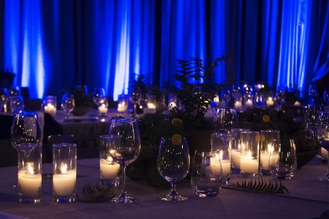 Tables are set up with candles, plants, and glasses in preparation for the Inaugural SBCC Foundation’s Fundraising Gala Event in the Sports Pavilion Gym at 6pm on Saturday, April 27, 2019, on City College in Santa Barbara, Calif.