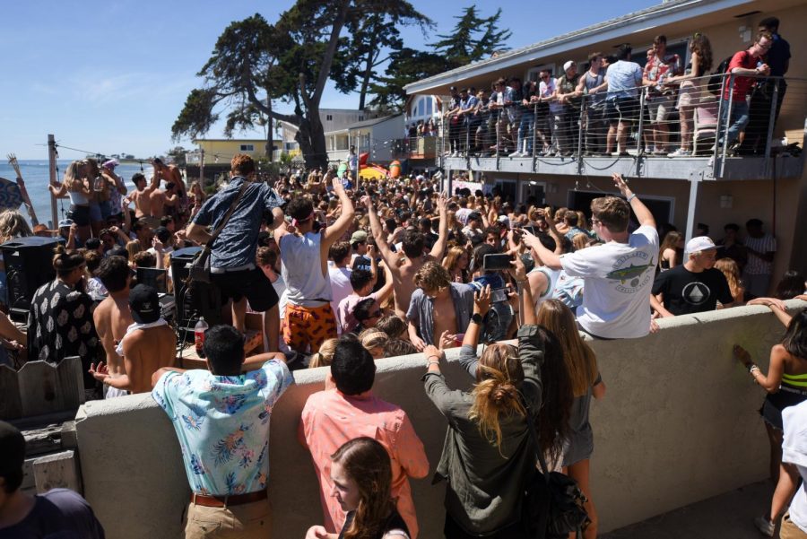 The crowd stretched across multiple backyards while a band played during Del Topia on Saturday, April 7, 2019, in Isla Vista in Santa Barbara, Calif.