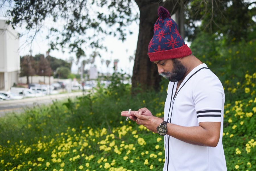 Mohammed All Zerine smokes a cigarette under the bridge between East and West campus on Monday, April 8, 2019, at City College in Santa Barbara, Calif. “I don’t smoke a lot, just in-between classes,” said All Zerine. “Then I can come back to class and focus on the teacher.”