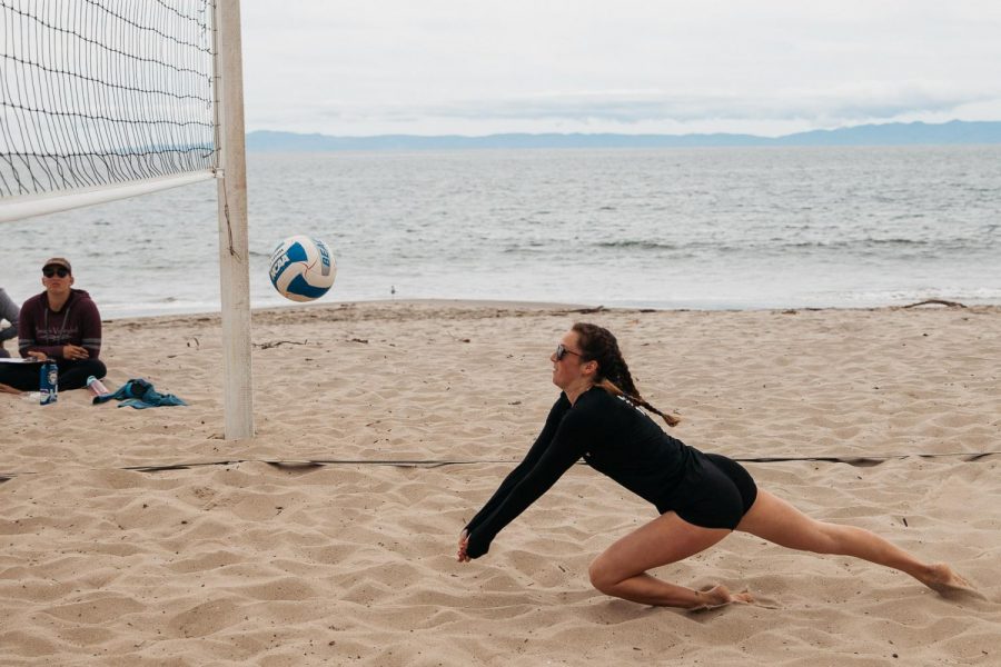 Emma Esparza dives for the ball on Friday, April 5, 2019, at East Beach in Santa Barbara, Calif.